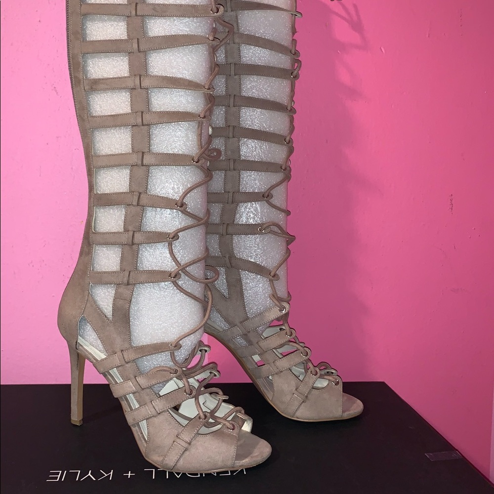 Taupe Lace-up gladiator heels.